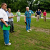 Alex Turco > Salt Creek Watershed representatives demonstrate a rain garden at Forest Park public golf course in Valparaiso Thursday morning.  The rain garden, one of several being installed at the golf course, is designed to combat run-off and improve water quality by allowing water to pool and infiltrate the groundwater supply while being filtered through the vegetation in the garden.  Photo by Alex Turco